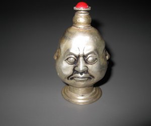 Antique snuff bottles. Perfect shape of copper-nickel alloy. Happy / angry / sad / happy.
