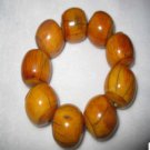 Bone. Hand-carved. Grinding. Drum-shaped bead bracelet