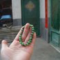 Natural alexandrite. The red. Green.The white color beads.. Bracelet. 8 mm beads, 24.