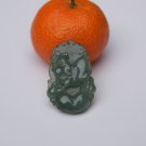 Natural dark green jade, hand-carved zodiac - pig pendant.Amulet Natural dark green jade, hand-carved zodiac - pig pendant.Amulet