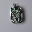 Green jade, enchase Tibet silver dragon pendant square. Amulet necklace. Green jade, enchase Tibet silver dragon pendant square. Amulet necklace.