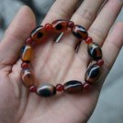 Natural red and black cloud (agate), nine drum beads.. Bracelet. Natural red and black cloud (agate), nine drum beads.. Bracelet.