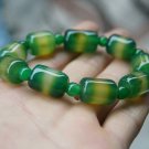 The green (agate), hand-carved.Cylindrical beads (bracelets). The rubber band strung together. The green (agate), hand-carved.Cylindrical beads (bracelets). The rubber band strung together.
