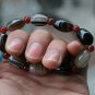 Nature black wrapping (agate) hand-carved, drum-shaped beads (bracelets).