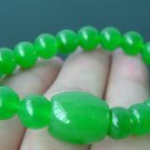 Green jade bracelet, carved, 8 mm beads + Passepartout, rubber bands strung together.