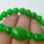 Green jade bracelet, carved, 8 mm beads + Passepartout, rubber bands strung together.