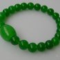 Green jade bracelet, carved, 8 mm beads + Passepartout, rubber bands strung together.