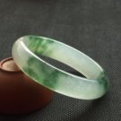 Fine emerald floating flower bracelet, hand carved bracelet.