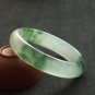 Fine emerald floating flower bracelet, hand carved bracelet.