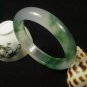 Fine emerald floating flower bracelet, hand carved bracelet.