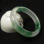 Fine emerald floating flower bracelet, hand carved bracelet.