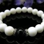 The natural white clams and black onyx bracelet, 10 mm beads, rubber band strung