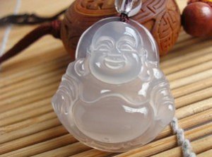 Natural white onyx. Hand-carved amulet.(Laughing Buddha). Pendant Necklace