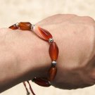 Natural red agate. The multi-faceted agate beads 7 +10 Tibetan silver lantern. Hand-woven bracelet. Natural red agate. The multi-faceted agate beads 7 +10 Tibetan silver lantern. Hand-woven bracelet.