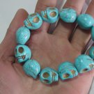 Hubei turquoise. Hand-carved skull-shaped beads bracelet, rubber band strung together. Hubei turquoise. Hand-carved skull-shaped beads bracelet, rubber band strung together.