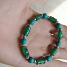 Green agate bamboo + turquoise beads + Tibetan silver, rubber band strung bracelet. Green agate bamboo + turquoise beads + Tibetan silver, rubber band strung bracelet.