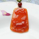 Hand-carved natural red agate dogs. Pendant necklace. Hand-carved natural red agate dogs. Pendant necklace.