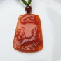 Hand-carved natural red agate dogs. Pendant necklace.
