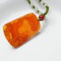 Hand-carved natural red agate dogs. Pendant necklace.