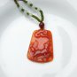 Hand-carved natural red agate dogs. Pendant necklace.