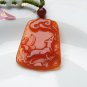 Hand-carved natural red agate dogs. Pendant necklace.