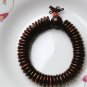 The sandalwood peace deduction, plus a Buddha head beads, prayer beads, bracelets