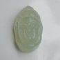 Natural light green jade pendant. The hand-carved guanyin head. Pendant necklace. Talisman