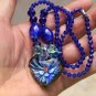 Artificial crystal blue orchid) of the (heart-shaped necklace pendant.28 x30 mm.