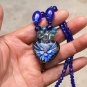 Artificial crystal blue orchid) of the (heart-shaped necklace pendant.28 x30 mm.