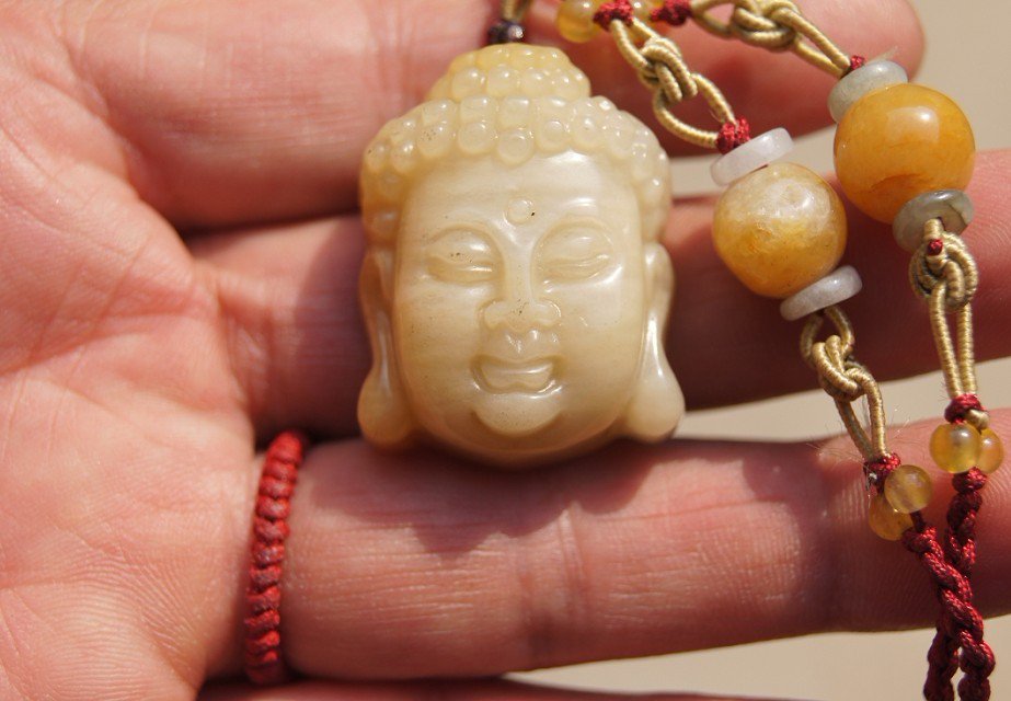 Hand-carved natural jade pendants, amulets, Buddha head pendant ...