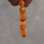 Red and yellow jade bracelet.10 mm, 21 beads. The tension of the rubber band.