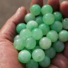 Green jade beads, a single diameter of about 13 mm (40 to a pack)