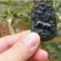 A hand-carved oval pendant. Natural dark green jade. Unicorn unicorn,