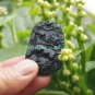 A hand-carved oval pendant. Natural dark green jade. Unicorn unicorn,