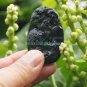 Natural dark green jade. A hand-carved oval necklace pendant. Crowing rooster,