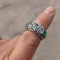 The alloy (fu) is inlaid with green jade rings. The vintage ring is about 17x8x3 mm