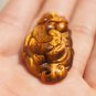 Natural tigereye amulet the mythical wild animal. Auspicious necklace pendant