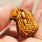 Natural tigereye purse type wing the mythical wild animal. Talisman necklace pendant