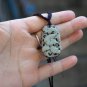 Natural purple jade. Seiko sculpture. A rectangle (sabrina). Necklace pendant