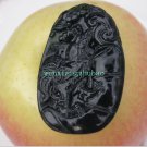 Natural dark green jade. A hand-carved oval necklace pendant. Crowing rooster,