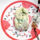 The natural color of jade, made by hand, and the two toads. Vintage necklace pendant The natural color of jade, made by hand, and the two toads. Vintage necklace pendant