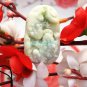 The natural color of jade, made by hand, and the two toads. Vintage necklace pendant