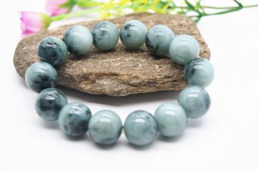 Handmade pure blue and white jade bracelet. 14 beads. A rubber band.