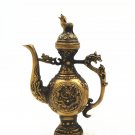 Vintage bronzes (made in the Ming dynasty) dragon wine POTS. Hands make an ornament.