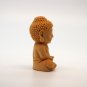 The yellow poplar wood is hand-carved and engraved - like the Buddha. Talisman necklace pendant.