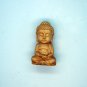 The yellow poplar wood is hand-carved and engraved - like the Buddha. Talisman necklace pendant.