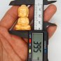 The yellow poplar wood is hand-carved and engraved - like the Buddha. Talisman necklace pendant.