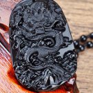 .Natural obsidian. Hand-carved oval flying dragon in sky - amulet - necklace pendant.