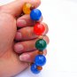 .Handmade natural red blue black agate beads 16 mm 10 rubber bands form an attractive bracelet.