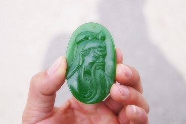 Hand-carved Mongolian jade longevity star, oval talisman necklace pendant.